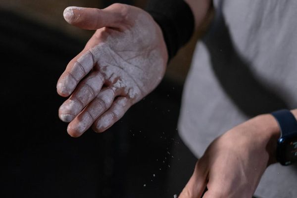 Detailed view of training equipment and chalk on hands